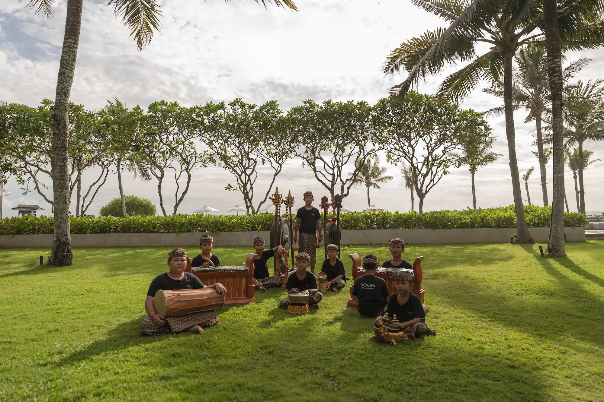 Young Balinese dancers practising outdoors at Soori Bali